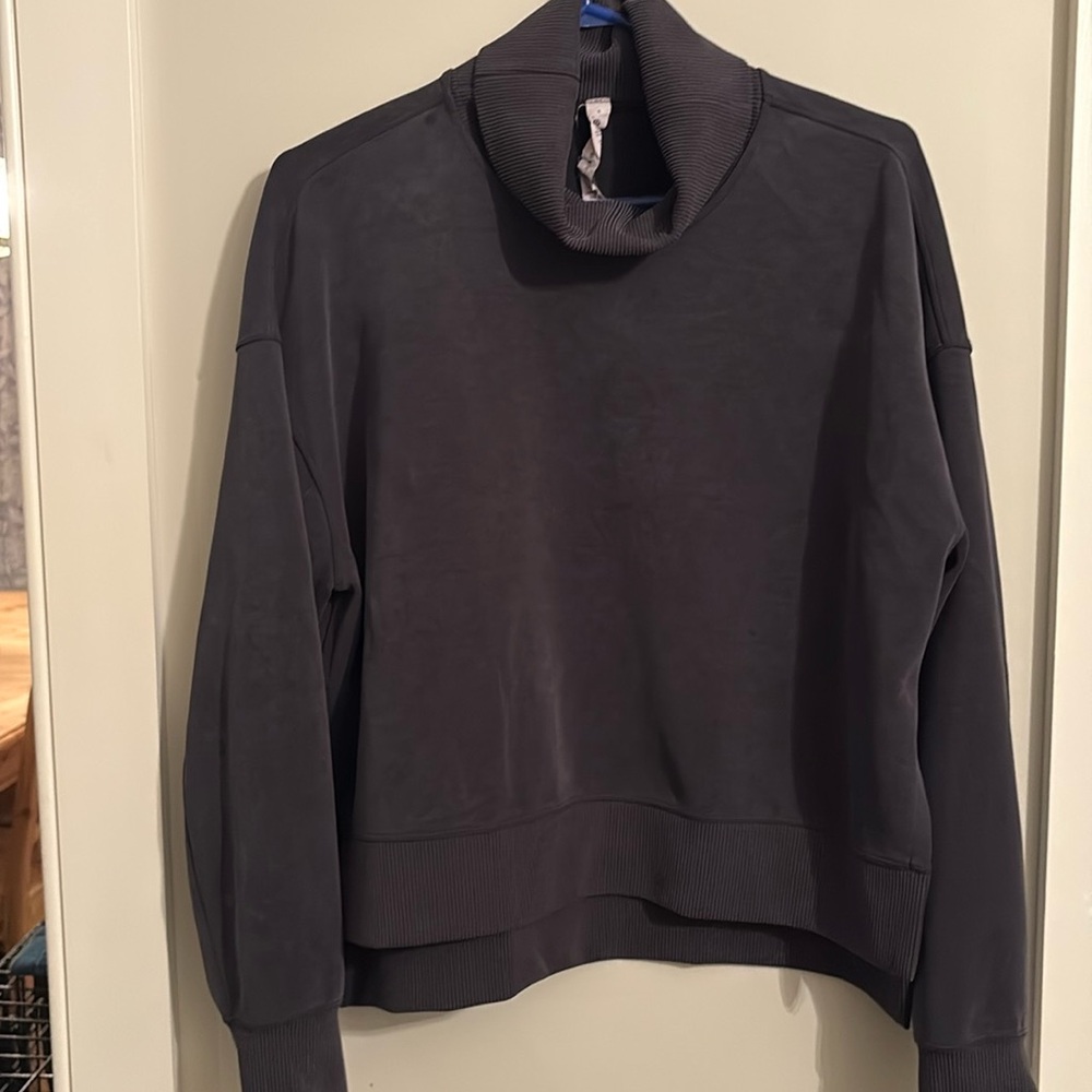 Soft stream turtleneck with side slits